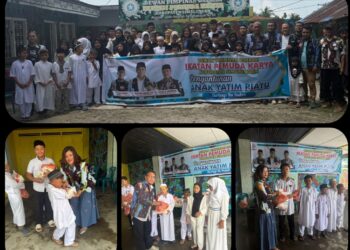 Jajaran pengurus DPD IPK Simalungun berfoto bersama anak-anak yatim piatu usai penyerahan bantuan tali asih di Sekretariat DPD IPK Simalungun, Kamis 19/3/2026.(Doc/Foto : Ist)